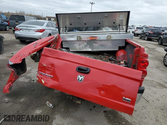 2007 Dodge Dakota ST z VIN 1D7HW28N07S163927, wystawiony jako Copart lot #46596084 z przebiegiem 173 970 mil mil oraz Nie do naprawy • Non repairable. Historia ofert i sprzedaży dostępna na DreamBid. Obrazek 6.