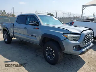 2021 Toyota Tacoma SR5 with VIN 5TFDZ5BN3MX067332, listed as a IAAI auction lot 42731530 with 15,255 mi miles and . Bid and sale history available at DreamBid. Image 1.