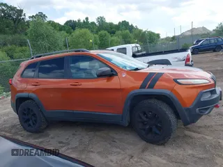 2015 Jeep Cherokee Trailhawk с VIN 1C4PJMBS8FW757154, выставлен на аукционе IAAI как лот 42591946 с пробегом 163 740 миль миль и . История ставок и продаж доступна на DreamBid. Изображение 13.