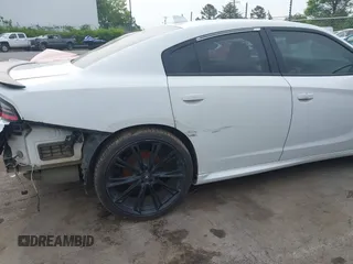 2018 Dodge Charger R/T with VIN 2C3CDXCT9JH265601, listed as a IAAI auction lot 41979466 with 107,842 mi miles and . Bid and sale history available at DreamBid. Image 19.