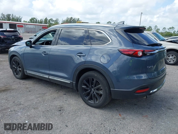 2021 Mazda CX-9 Carbon Edition with VIN JM3TCADY3M0517722, listed as a IAAI auction lot 41951164 with 43,868 mi miles and . Bid and sale history available at carsss.com. Image 3.