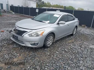 2015 Nissan Altima 2.5 SV with VIN 1N4AL3AP5FC267088, listed as a IAAI auction lot 41914200 with 154,518 mi miles. Bid and sale history available at carsss.com. Image 2.