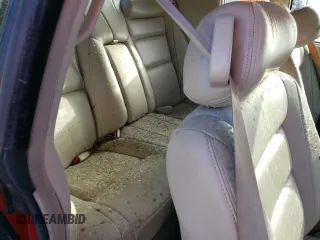1998 Cadillac Eldorado z VIN 1G6EL12Y4WU610896, wystawiony jako Copart lot #74662244 z przebiegiem Nie podano mil oraz Szkody całkowita. Historia ofert i sprzedaży dostępna na DreamBid. Obrazek 10.