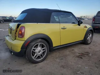 2009 MINI Cooper Convertible with VIN WMWMR33549TU95327, listed as a Copart auction lot 88493115 with 76,714 mi miles and Salvage Title. Bid and sale history available at carsss.com. Image 3.