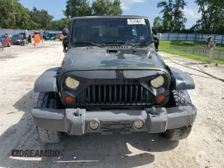 2008 Jeep Wrangler Unlimited X with VIN 1J4GA39118L633877, listed as a Copart auction lot 63652795 with 129,856 mi miles and Clean title. Bid and sale history available at DreamBid. Image 5.