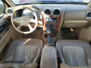 2003 GMC Envoy SLT with VIN 1GKDT13S032245485, listed as a Copart auction lot 84385304 with 139,183 mi miles and Salvage Title. Bid and sale history available at carsss.com. Image 8.