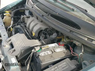 2000 Dodge Caravan with VIN 2B4GP25R5YR851917, listed as a IAAI auction lot 41833056 with 176,863 mi miles and . Bid and sale history available at DreamBid. Image 12.
