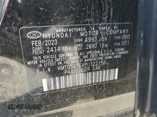 2023 Genesis G70 3.3T with VIN KMTG54TE4PU122153, listed as a Copart auction lot 50794015 with 13,604 mi miles and Salvage title. Bid and sale history available at DreamBid. Image 14.