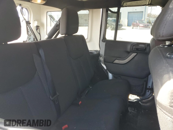 2016 Jeep Wrangler Unlimited Sport with VIN 1C4BJWDG1GL146772, listed as a Copart auction lot 49782385 with 87,286 mi miles and Salvage Title. Bid and sale history available at DreamBid. Image 11.