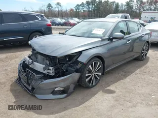 2019 Nissan Altima 2.5 Platinum with VIN 1N4BL4FV1KC104563, listed as a IAAI auction lot 41828774 with 44,006 mi miles. Bid and sale history available at carsss.com. Image 17.