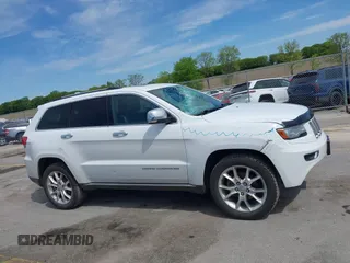 2014 Jeep Grand Cherokee Summit with VIN 1C4RJFJG0EC174871, listed as a IAAI auction lot 42341312 with 170,743 mi miles and . Bid and sale history available at DreamBid. Image 14.