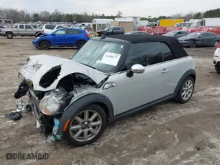 2011 MINI Cooper Convertible s with VIN WMWZP3C55BTX82922, listed as a IAAI auction lot 41408777 with 82,764 mi miles. Bid and sale history available at carsss.com. Image 2.
