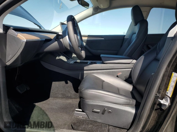 2023 Tesla Model Y Long Range z VIN 7SAYGAEE7PF859030, wystawiony jako Copart lot #58965185 z przebiegiem 18 421 mil mil oraz Czysty tytuł • Clean title. Historia ofert i sprzedaży dostępna na DreamBid. Obrazek 7.