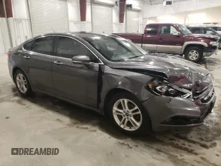2018 Ford Fusion SE z VIN 3FA6P0HD6JR260522, wystawiony jako Copart lot #54382215 z przebiegiem 151 611 mil mil oraz Szkoda całkowita • Salvage title. Historia ofert i sprzedaży dostępna na DreamBid. Obrazek 4.