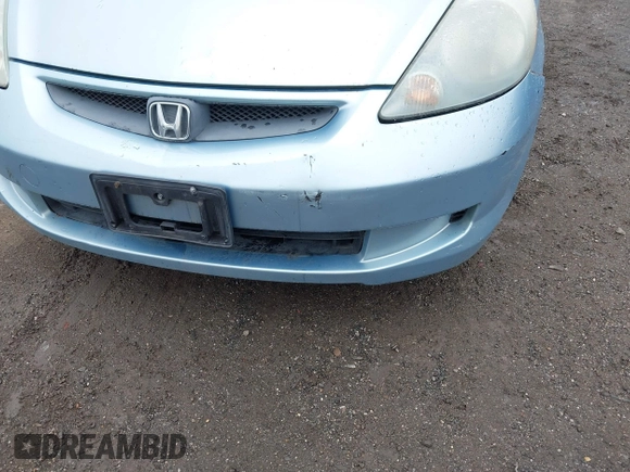 2007 Honda Fit z VIN JHMGD38417S035560, wystawiony jako IAAI lot #41960233 z przebiegiem 130 161 mil mil oraz . Historia ofert i sprzedaży dostępna na DreamBid. Obrazek 13.