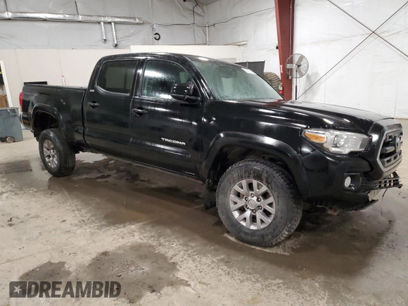 2017 Toyota Tacoma SR5 with VIN 5TFDZ5BN5HX028165, listed as a Copart auction lot 52676445 with 114,824 mi miles and Salvage Title. Bid and sale history available at carsss.com. Image 4.