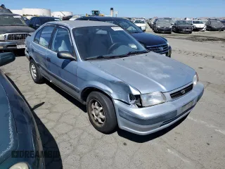 1995 Toyota Tercel DX z VIN JT2EL56E7S7011335, wystawiony jako Copart lot #67978774 z przebiegiem 182 025 mil mil oraz Szkoda całkowita • Salvage title. Historia ofert i sprzedaży dostępna na DreamBid. Obrazek 4.