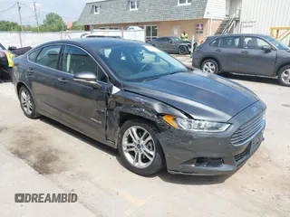 2016 Ford Fusion Titanium Hybrid with VIN 3FA6P0RU9GR299175, listed as a IAAI auction lot 42381504 with 184,284 mi miles and . Bid and sale history available at DreamBid. Image 1.