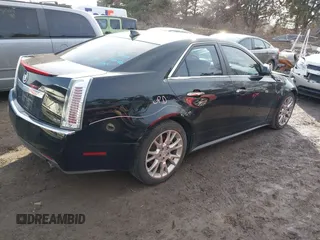 2011 Cadillac CTS with VIN 1G6D25ED1B0161919, listed as a IAAI auction lot 41486191 with 138,567 mi miles and . Bid and sale history available at DreamBid. Image 4.