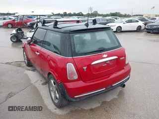 2005 MINI Hardtop with VIN WMWRC33415TJ67372, listed as a IAAI auction lot 42120875 with 153,727 mi miles and . Bid and sale history available at DreamBid. Image 3.