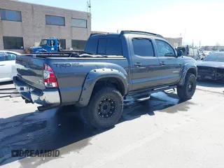 2010 Toyota Tacoma PreRunner with VIN 5TEJU4GN9AZ706709, listed as a IAAI auction lot 41968841 with 123,424 mi miles and . Bid and sale history available at DreamBid. Image 4.