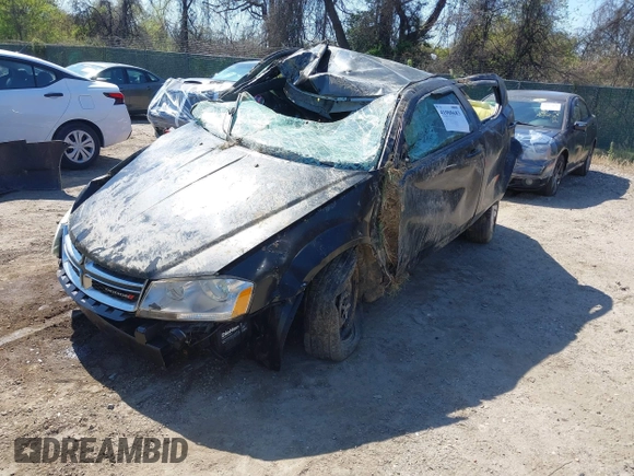 2013 Dodge Avenger SE with VIN 1C3CDZAB7DN580897, listed as a IAAI auction lot 41988683 with Not Provided miles and . Bid and sale history available at carsss.com. Image 18.