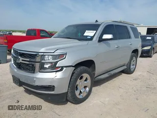 2015 Chevrolet Tahoe LT with VIN 1GNSCBKC9FR111984, listed as a IAAI auction lot 42003685 with 186,391 mi miles and . Bid and sale history available at DreamBid. Image 18.