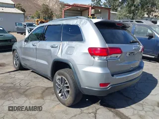 2020 Jeep Grand Cherokee Limited with VIN 1C4RJEBG2LC202014, listed as a IAAI auction lot 40654091 with 77,260 mi miles. Bid and sale history available at carsss.com. Image 3.