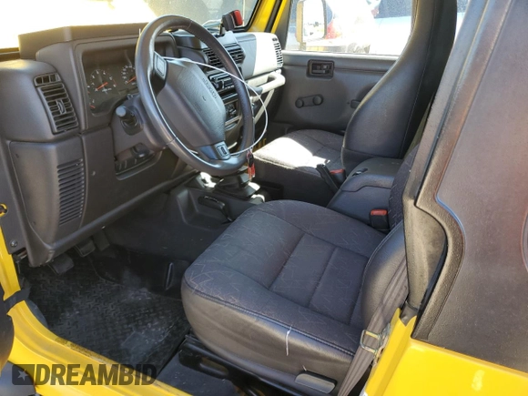 2002 Jeep Wrangler X with VIN 1J4FA39S42P725876, listed as a Copart auction lot 71789864 with 154,991 mi miles and Salvage Title. Bid and sale history available at carsss.com. Image 7.
