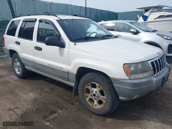 1999 Jeep Grand Cherokee Laredo with VIN 1J4GW58SXXC623404, listed as a IAAI auction lot 41838797 with 0 mi miles. Bid and sale history available at carsss.com. Image 1.