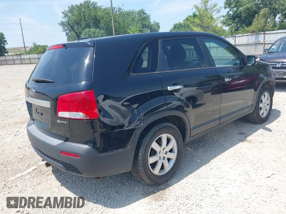 2013 Kia Sorento LX with VIN 5XYKT3A19DG381288, listed as a IAAI auction lot 42797647 with 220,000 mi miles and . Bid and sale history available at DreamBid. Image 4.