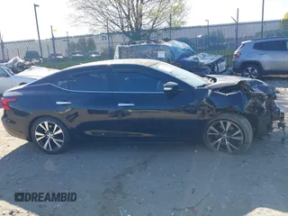 2016 Nissan Maxima SL with VIN 1N4AA6AP3GC408894, listed as a IAAI auction lot 42051320 with 128,516 mi miles and . Bid and sale history available at DreamBid. Image 14.