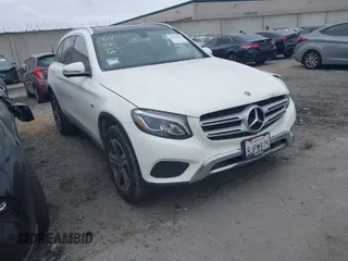 2019 Mercedes-Benz GLC 350e z VIN WDC0G5EB0KF585613, wystawiony jako IAAI lot #41892618 z przebiegiem 42 777 mil mil oraz . Historia ofert i sprzedaży dostępna na DreamBid. Obrazek 1.