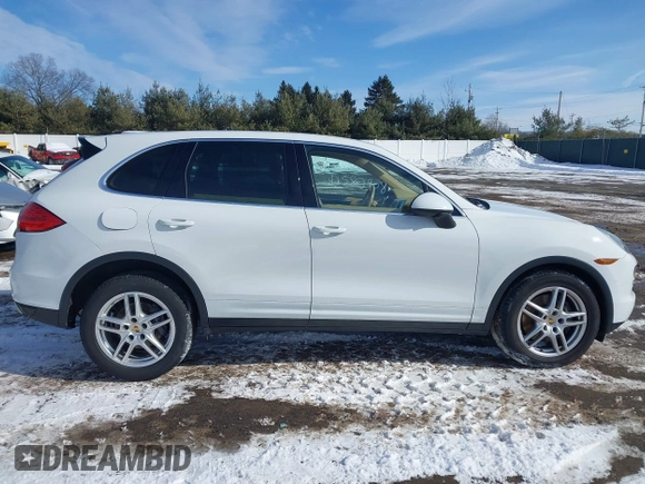 2014 Porsche Cayenne with VIN WP1AA2A2XELA95734, listed as a IAAI auction lot 41583908 with 95,751 mi miles and . Bid and sale history available at DreamBid. Image 13.