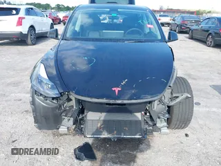 2024 Tesla Model Y Long Range z VIN 7SAYGDEE9RA293261, wystawiony jako IAAI lot #42118735 z przebiegiem 11 454 mil mil oraz . Historia ofert i sprzedaży dostępna na DreamBid. Obrazek 6.
