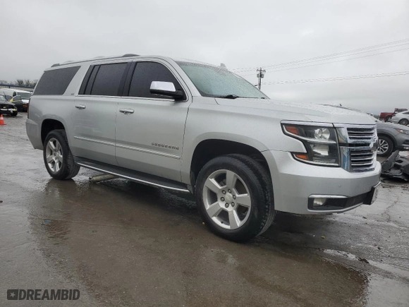 2015 Chevrolet Suburban LTZ with VIN 1GNSCKKCXFR587516, listed as a Copart auction lot 50877665 with 193,618 mi miles and Salvage Title. Bid and sale history available at carsss.com. Image 4.