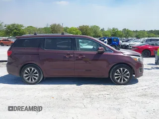 2015 Kia Sedona EX with VIN KNDMC5C19F6018139, listed as a IAAI auction lot 42031165 with 136,484 mi miles. Bid and sale history available at carsss.com. Image 13.