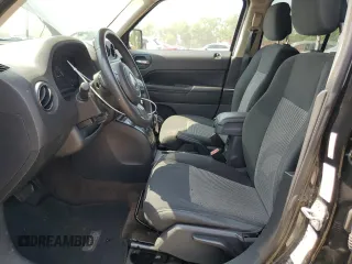 2014 Jeep Patriot Latitude with VIN 1C4NJRFB3ED761587, listed as a Copart auction lot 60554245 with 138,763 mi miles and Salvage title. Bid and sale history available at DreamBid. Image 7.