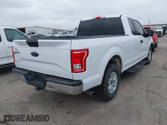 2017 Ford F-150 XL with VIN 1FTEX1CG5HKC87769, listed as a IAAI auction lot 41711952 with 147,486 mi miles. Bid and sale history available at carsss.com. Image 4.