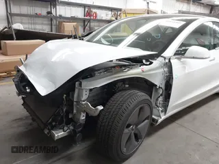 2020 Tesla Model 3 Standard Range Plus with VIN 5YJ3E1EA7LF805828, listed as a IAAI auction lot 41841505 with 44,946 mi miles and . Bid and sale history available at DreamBid. Image 6.