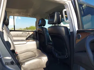 2012 Infiniti QX56 7-passenger with VIN JN8AZ2NFXC9515305, listed as a IAAI auction lot 42031957 with 185,173 mi miles. Bid and sale history available at carsss.com. Image 8.