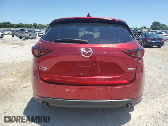 2018 Mazda CX-5 Grand Touring with VIN JM3KFBDM6J0472664, listed as a Copart auction lot 66394465 with 52,016 mi miles and Clean title. Bid and sale history available at DreamBid. Image 6.
