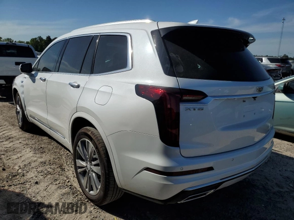 2024 Cadillac XT6 FWD Premium Luxury with VIN 1GYKPCRS1RZ700963, listed as a Copart auction lot 49031094 with 2,977 mi miles and Salvage Title. Bid and sale history available at carsss.com. Image 2.