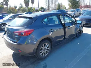 2016 Mazda Mazda3 i Grand Touring with VIN JM1BM1N74G1333699, listed as a IAAI auction lot 41836178 with 194,946 mi miles. Bid and sale history available at carsss.com. Image 4.