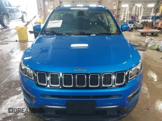 2020 Jeep Compass Latitude with VIN 3C4NJDBBXLT104849, listed as a IAAI auction lot 41606035 with 116,706 mi miles. Bid and sale history available at carsss.com. Image 6.