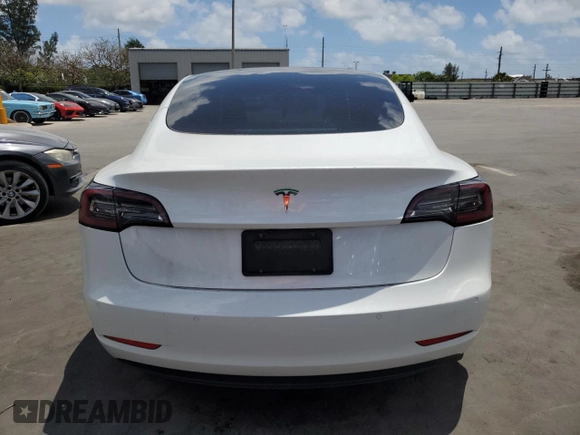 2021 Tesla Model 3 Standard Range Plus with VIN 5YJ3E1EA2MF985463, listed as a Copart auction lot 53311455 with 23,176 mi miles and Clean Title. Bid and sale history available at DreamBid. Image 6.