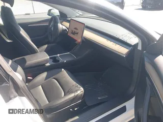 2023 Tesla Model 3 with VIN 5YJ3E1EA0PF548498, listed as a IAAI auction lot 42334326 with 17,674 mi miles and . Bid and sale history available at DreamBid. Image 5.