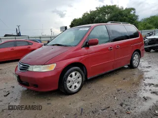 2003 Honda Odyssey EX with VIN 5FNRL18643B129670, listed as a Copart auction lot 85890784 with 222,216 mi miles and Salvage Title. Bid and sale history available at carsss.com. Image 1.