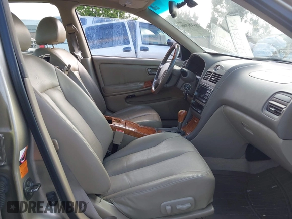 2004 Infiniti I35 with VIN JNKDA31A74T209228, listed as a IAAI auction lot 42181808 with 202,647 mi miles. Bid and sale history available at carsss.com. Image 5.