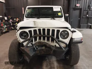 2021 Jeep Wrangler Unlimited Freedom with VIN 1C4HJXDNXMW681267, listed as a IAAI auction lot 42026181 with 40,143 mi miles and . Bid and sale history available at DreamBid. Image 12.
